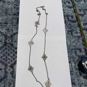 Free w purchase: Icing 48” necklace w ornate filigree and crystal stations